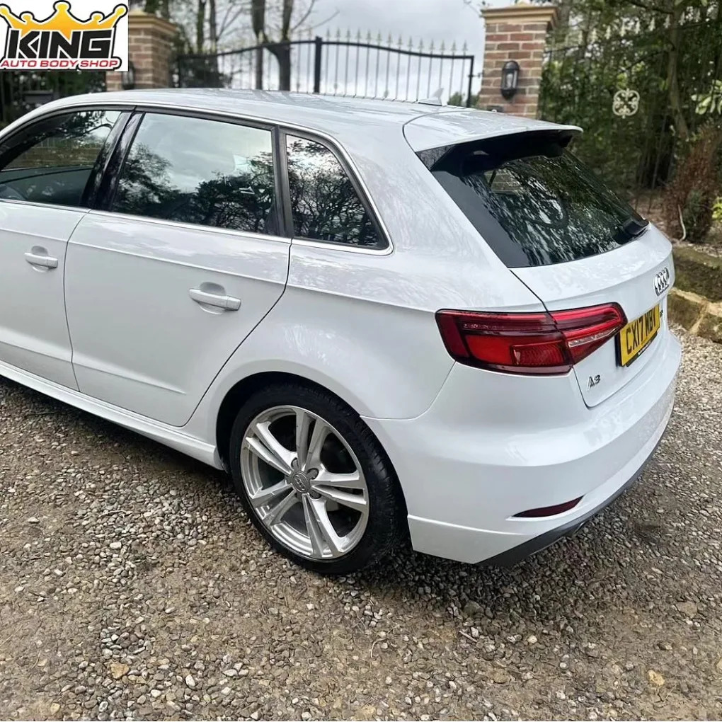 white Audi A3 rear quarter and bumper after repair