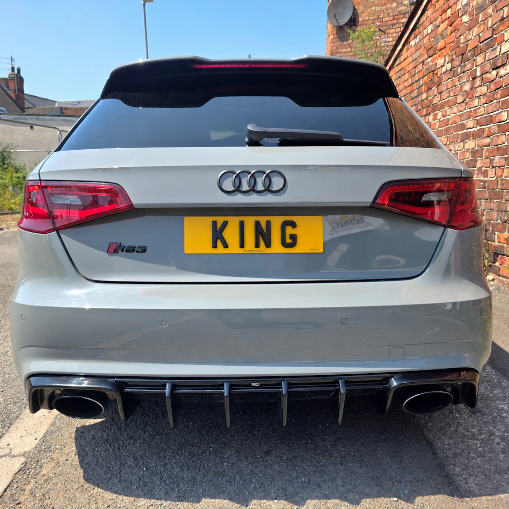 Rear of a grey Audi with custom finish
